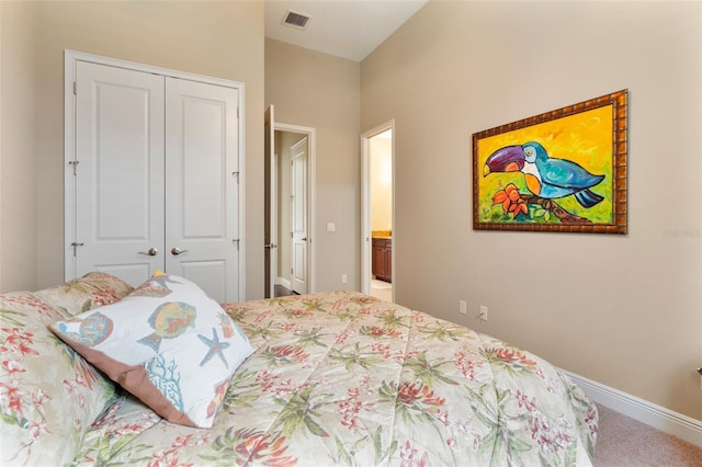 bedroom featuring carpet floors and a closet