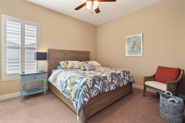 bedroom with ceiling fan and carpet flooring