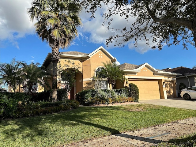 single story home with a garage and a front yard