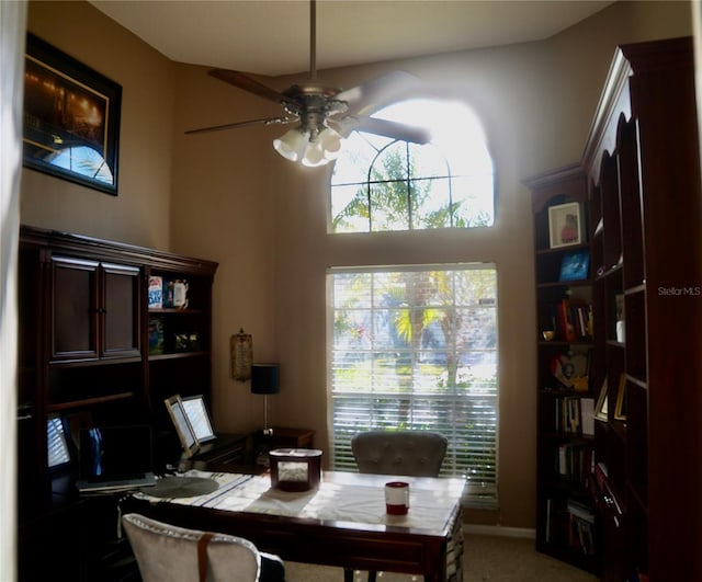 dining area with ceiling fan