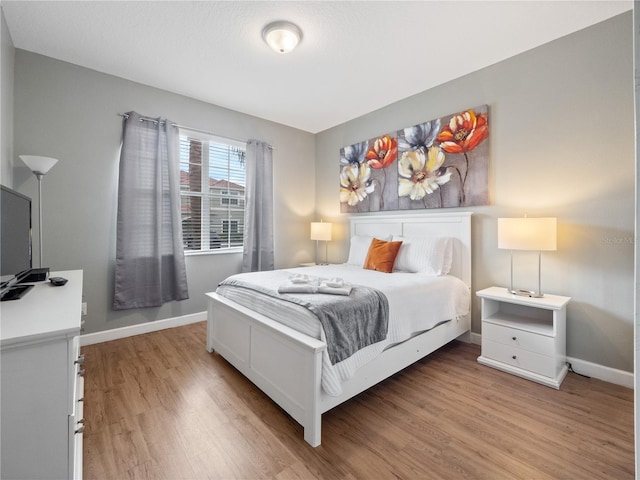 bedroom featuring light hardwood / wood-style floors