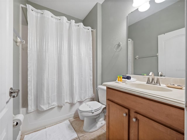 full bathroom featuring toilet, tile patterned flooring, shower / bath combo, and vanity