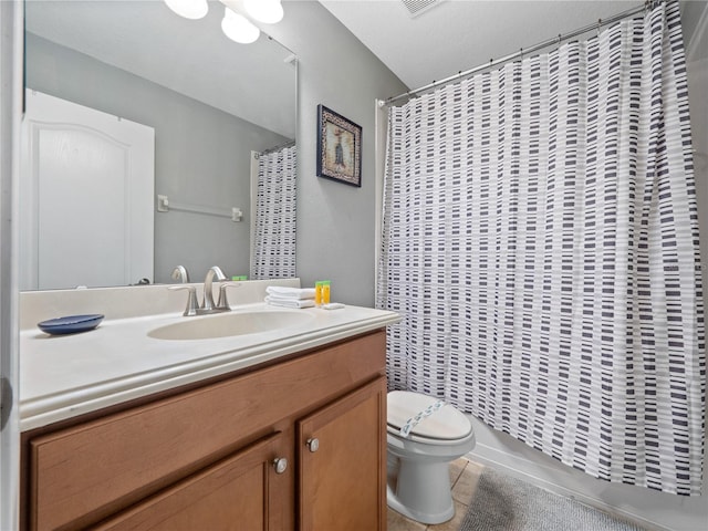 full bathroom featuring toilet, vanity, and shower / bath combination with curtain