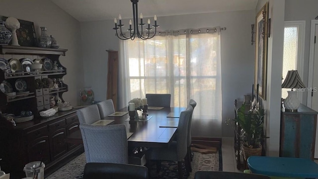 dining room with an inviting chandelier and a wealth of natural light