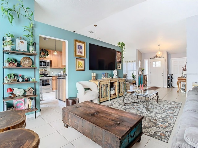 living room with light tile patterned floors