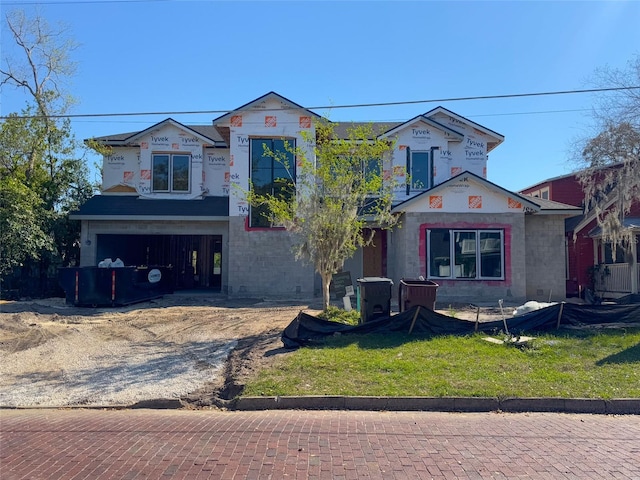 property under construction featuring brick siding, an attached garage, a front lawn, and central AC unit