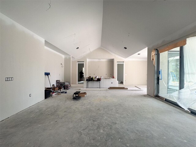interior space featuring lofted ceiling