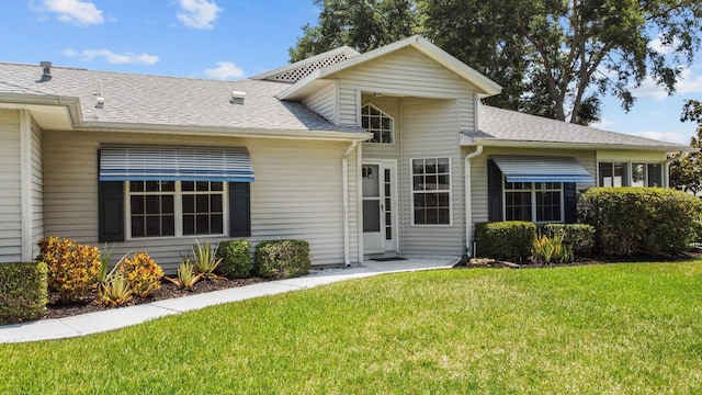 view of front of house with a front yard