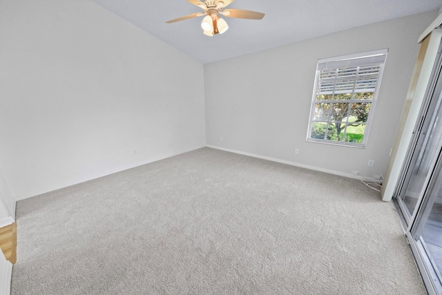 empty room with light colored carpet and ceiling fan