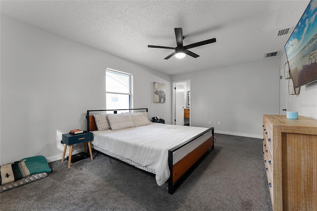 carpeted bedroom with ceiling fan, a textured ceiling, and connected bathroom