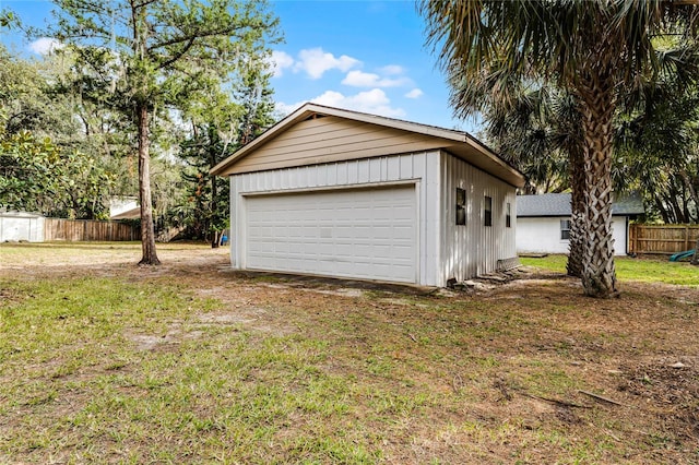 garage with a lawn