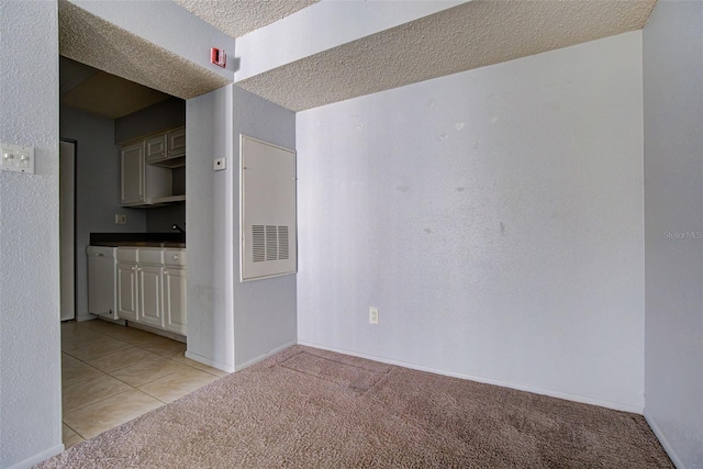 interior space with a textured ceiling