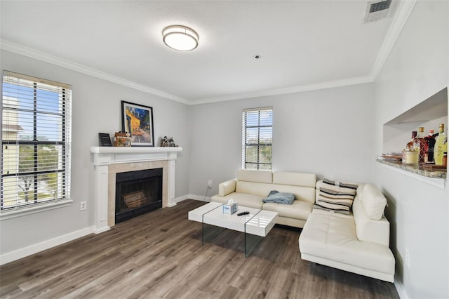 living room featuring crown molding and dark hardwood / wood-style floors