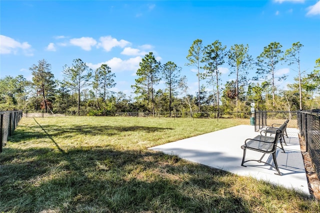 surrounding community featuring a yard and a patio area