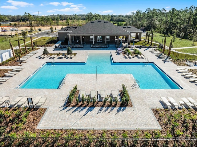 view of swimming pool featuring a patio area