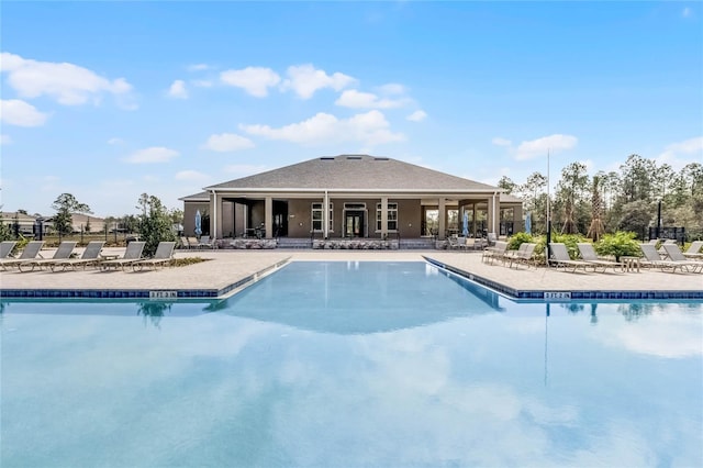 view of swimming pool featuring a patio area