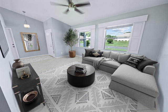 living room featuring lofted ceiling and ceiling fan