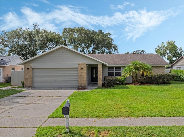 ranch-style house featuring brick siding, roof with shingles, concrete driveway, a front yard, and a garage