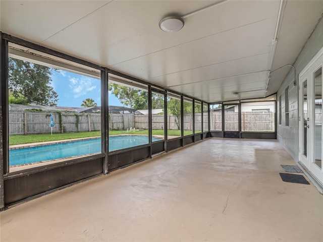 unfurnished sunroom featuring plenty of natural light