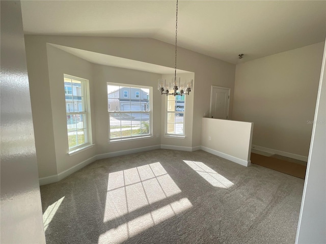 unfurnished dining area with light carpet, an inviting chandelier, and lofted ceiling