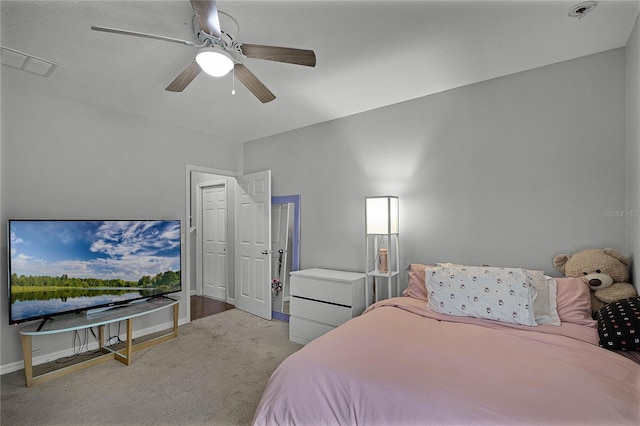 carpeted bedroom with ceiling fan