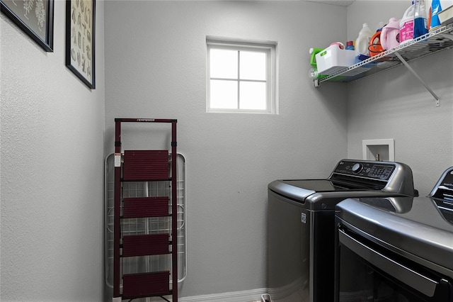 laundry area with washer and clothes dryer