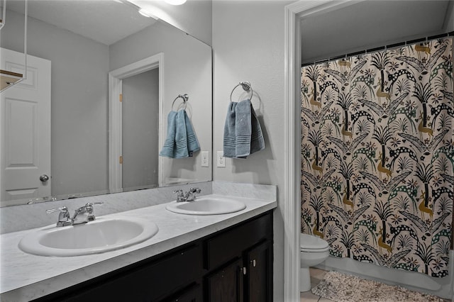 bathroom featuring toilet, vanity, tile patterned floors, and walk in shower