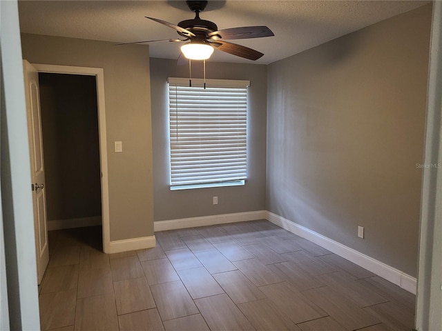 empty room with ceiling fan