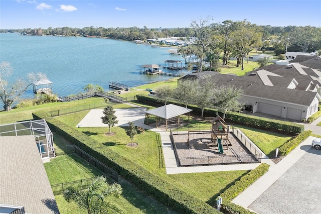 birds eye view of property with a water view