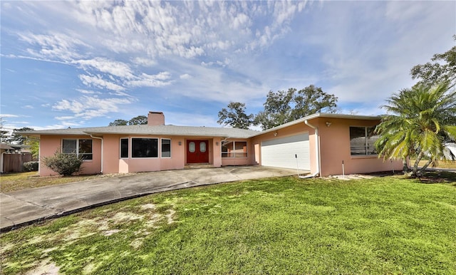 ranch-style house with a front lawn and a garage