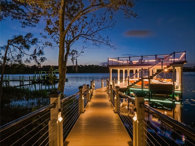 view of dock with a water view