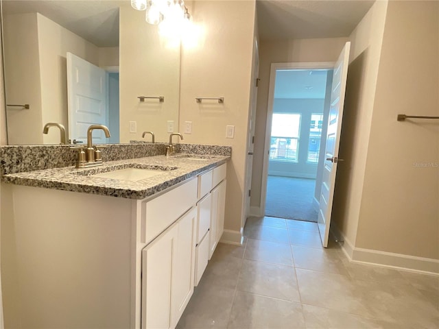 bathroom featuring vanity and tile patterned flooring