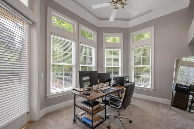 office featuring light carpet, a healthy amount of sunlight, and ceiling fan