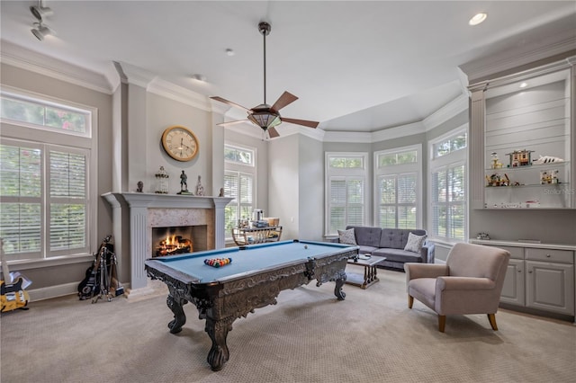 recreation room with light carpet, ceiling fan, crown molding, and billiards