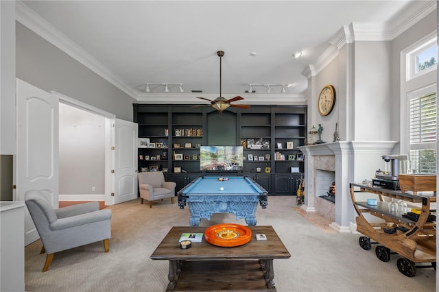 rec room with light colored carpet, billiards, a wealth of natural light, and track lighting