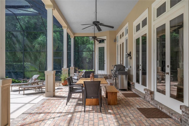 view of patio with ceiling fan, french doors, and a grill