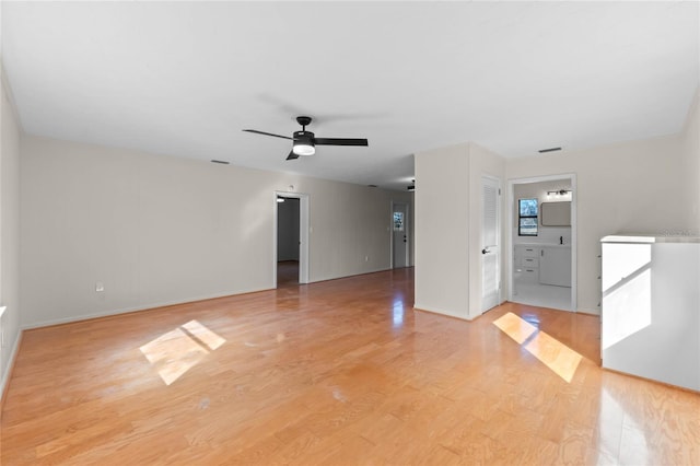 interior space with light hardwood / wood-style floors and ceiling fan