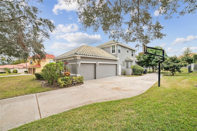 view of home's exterior with a garage and a lawn