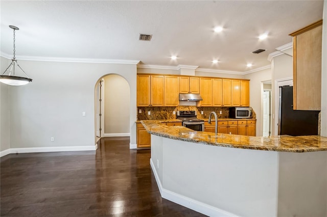 kitchen with stone counters, crown molding, hanging light fixtures, decorative backsplash, and stainless steel appliances