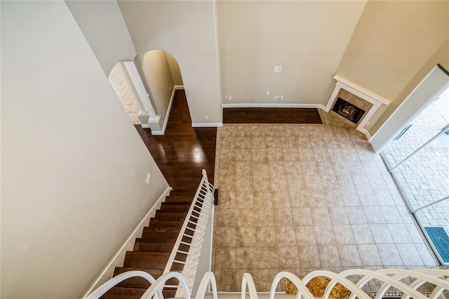 unfurnished living room with dark hardwood / wood-style flooring