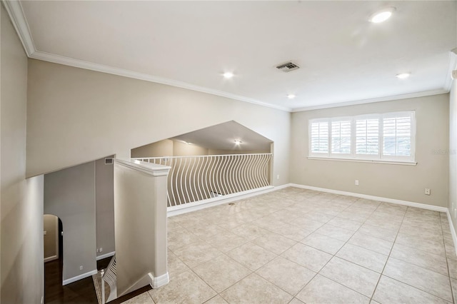 additional living space with light tile patterned floors