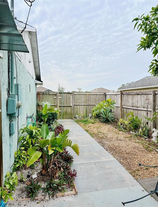 view of yard with a patio area and a fenced backyard