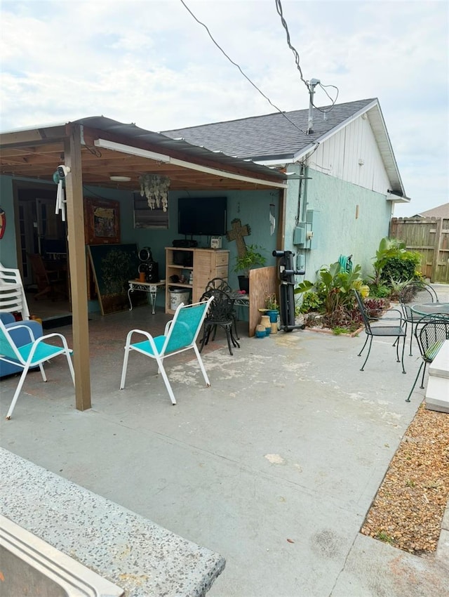 view of patio with fence