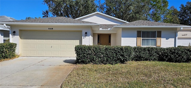 ranch-style house with a front lawn and a garage