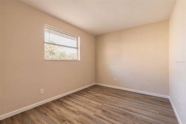 empty room featuring hardwood / wood-style floors