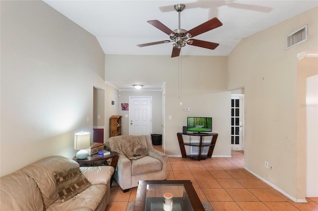 1309 Paradise Ln, Winter Park, FL 32792 - living room with light tile patterned floors, vaulted ceiling, and ceiling fan