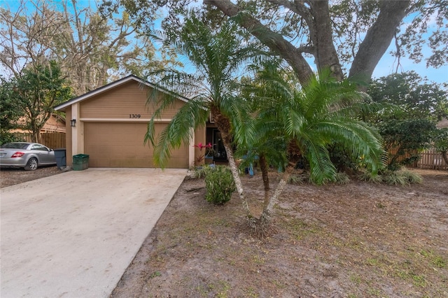 1309 Paradise Ln, Winter Park, FL 32792 - view of front of house featuring a garage