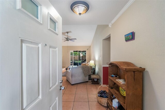 1309 Paradise Ln, Winter Park, FL 32792 - interior space with ceiling fan, crown molding, and light tile patterned floors
