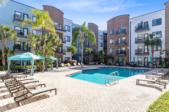 view of swimming pool featuring a patio