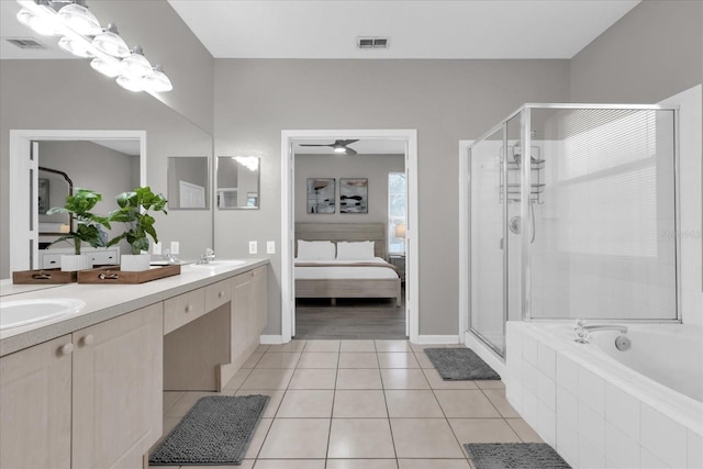 bathroom featuring ceiling fan, tile patterned floors, vanity, and independent shower and bath